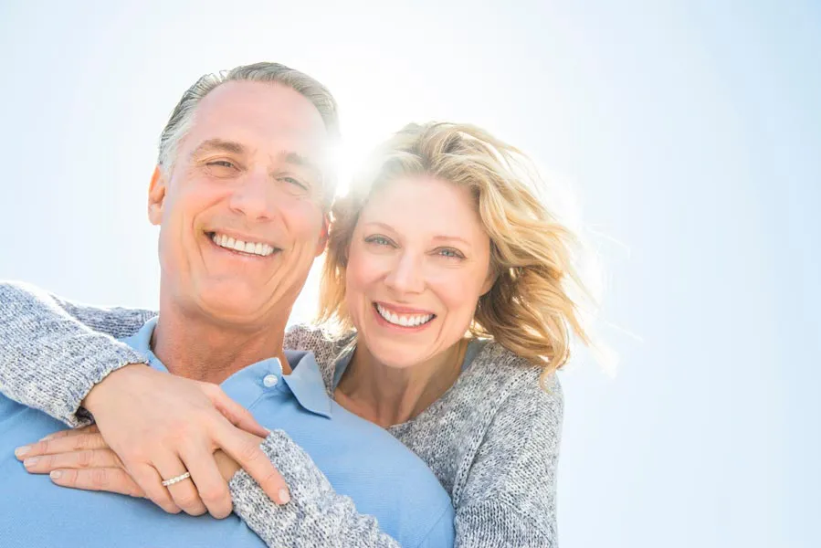 A couple with clear radiant skin. Get Radiofrequency Microneedling for Age Spots from Brandi Terra, NP at Oak & Stone Wellness in San Diego.